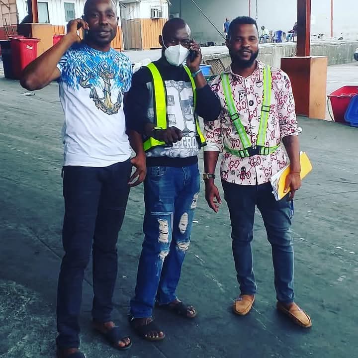 CEO with staff at terminal